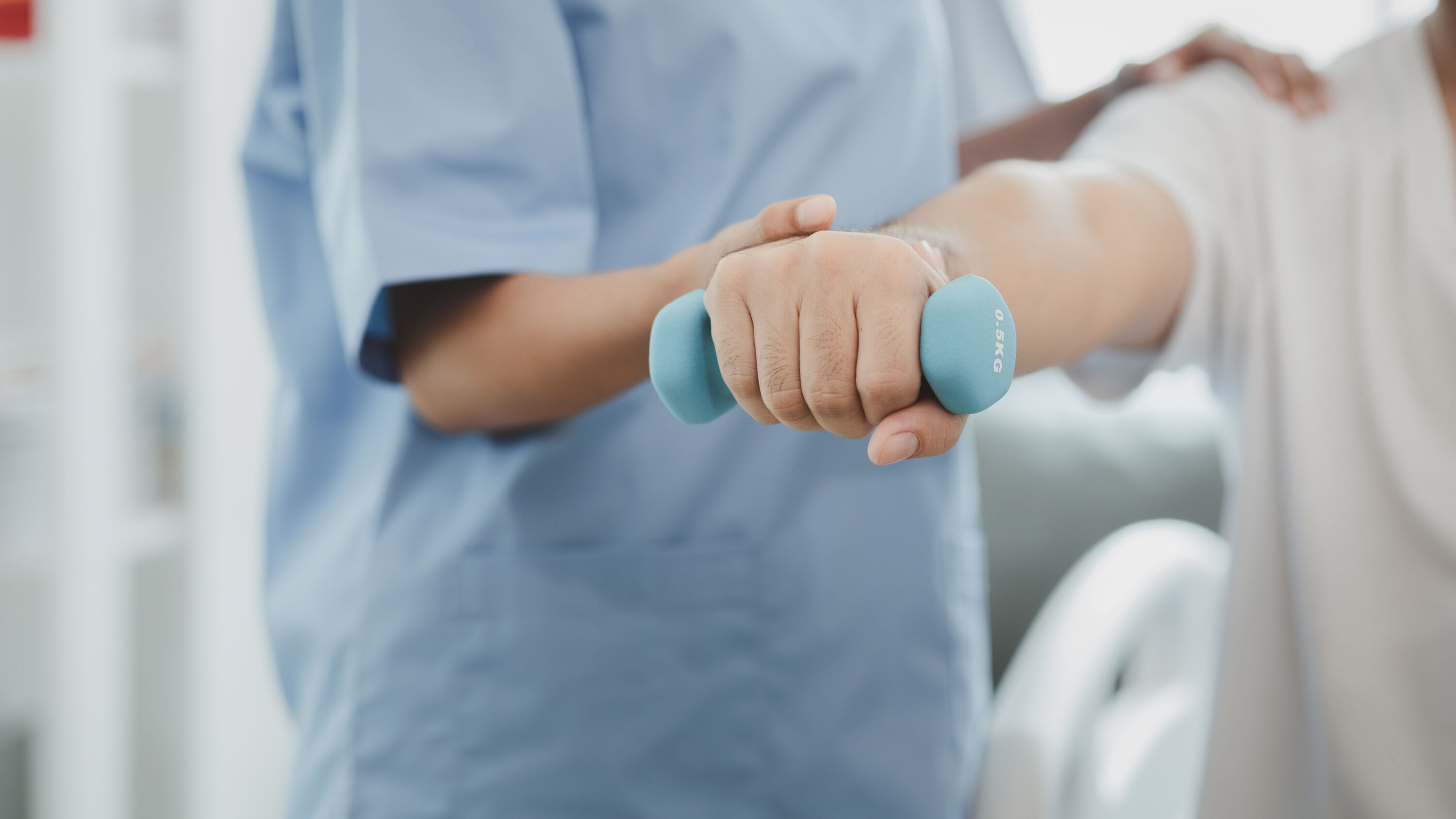 A nurse helping a patient