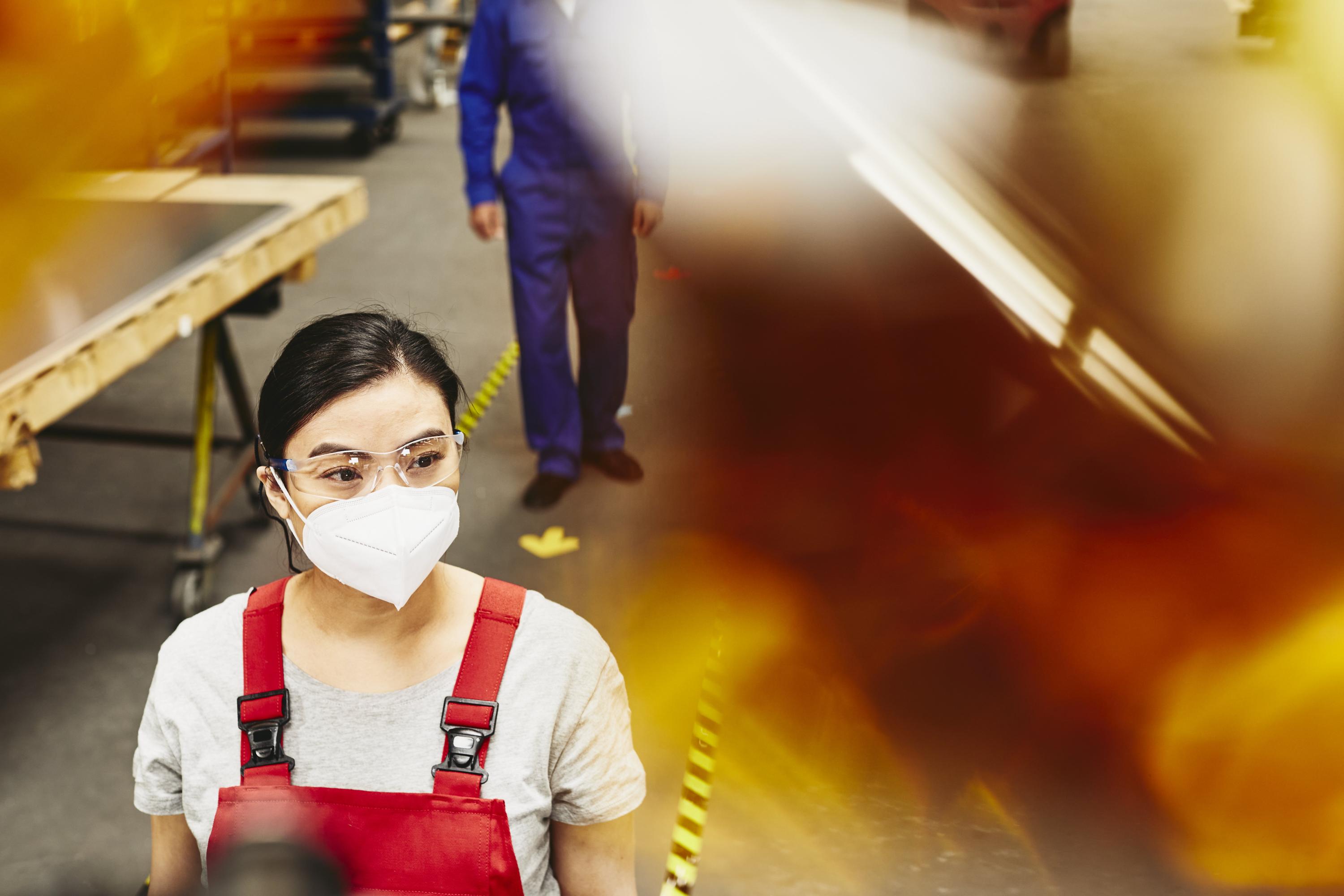 industrial worker wearing a mask