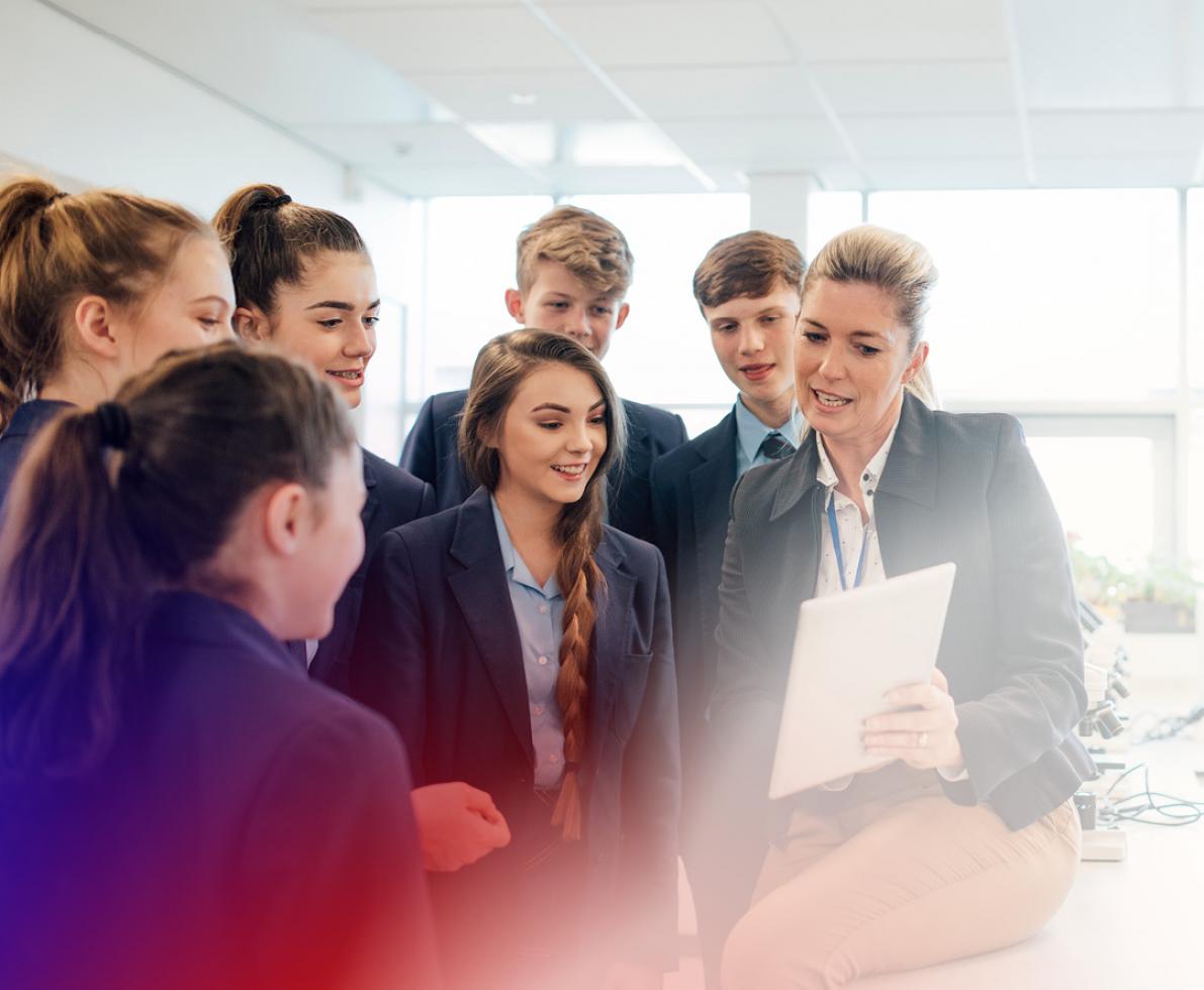 Woman explaining something to her students